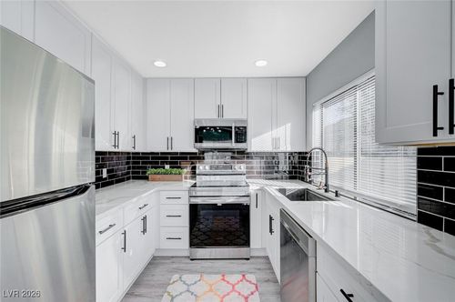 1040 Neil Armstrong Cir, Las Vegas, NV, 89145-6173 | Card Image