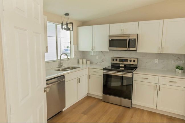1220 Zapata Pl, House other with 2 bedrooms, 2 bathrooms and null parking in LADY LAKE FL | Image 6