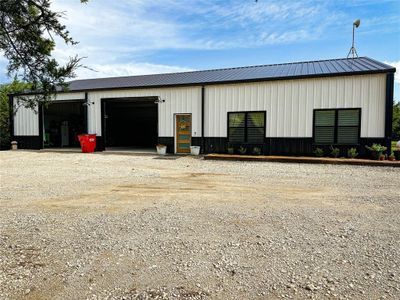 View of outdoor structure featuring a garage | Image 2