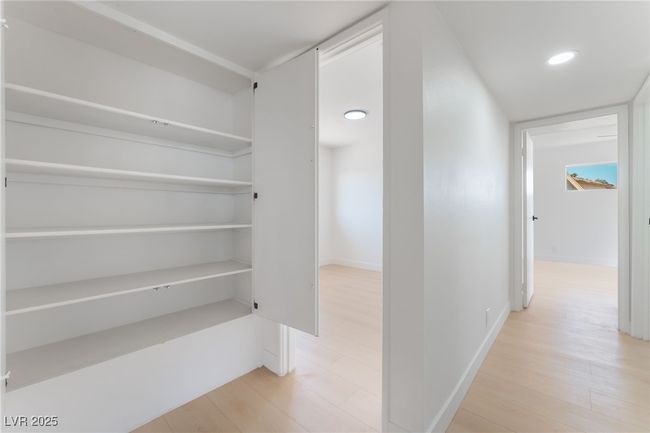 Corridor featuring light wood-style floors | Image 25