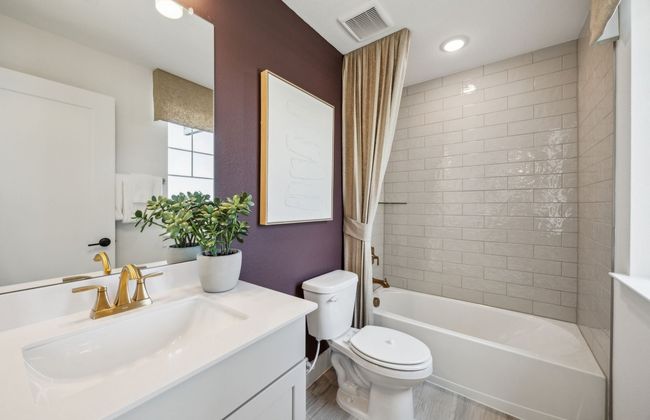 Upgraded secondary bath with elegant finishes *Model representation | Image 25