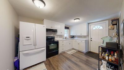 Updated kitchen with updated cabinets and LVP flooring! | Image 2