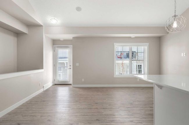 915 Cranbrook Walk Se, Home with 2 bedrooms, 1 bathrooms and 1 parking in Calgary AB | Image 6