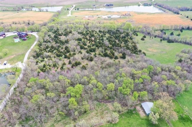Birds eye view of property with a water view and a rural view | Image 33