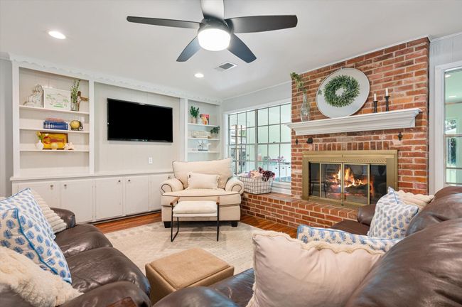 Warm, cozy family room with great built-ins | Image 12