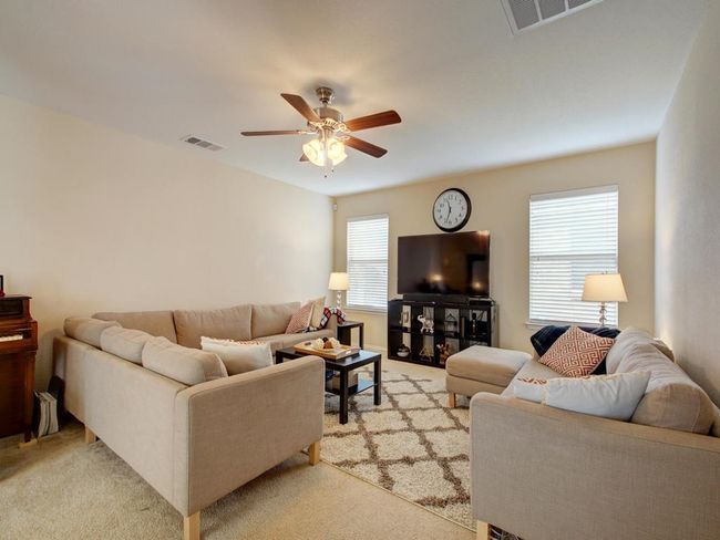 Staged earlier. Carpet replaced with Laminate flooring | Image 8