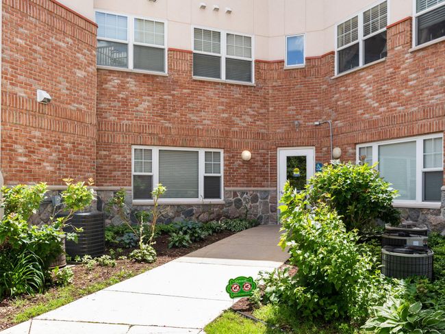 UNIT-104 - 301 N Lake St, Condo with 2 bedrooms, 2 bathrooms and null parking in Cadillac MI | Image 21