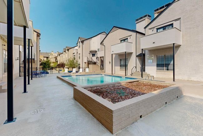 Community pool featuring a patio | Image 14