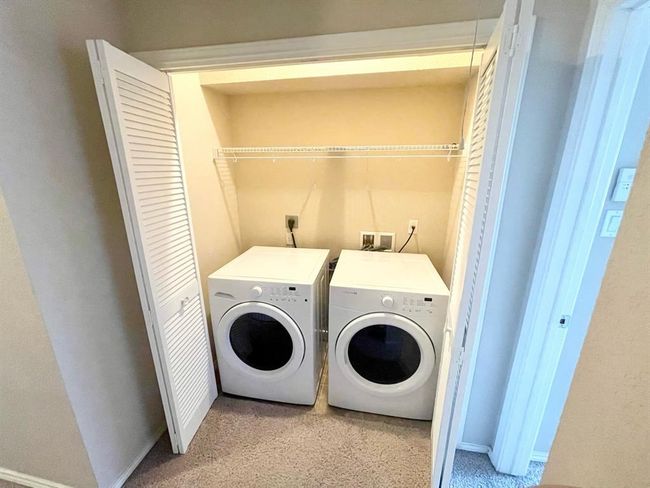 Laundry room with washer and dryer | Image 10