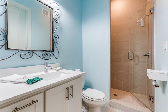 Full bathroom with walk-in shower. | Image 19