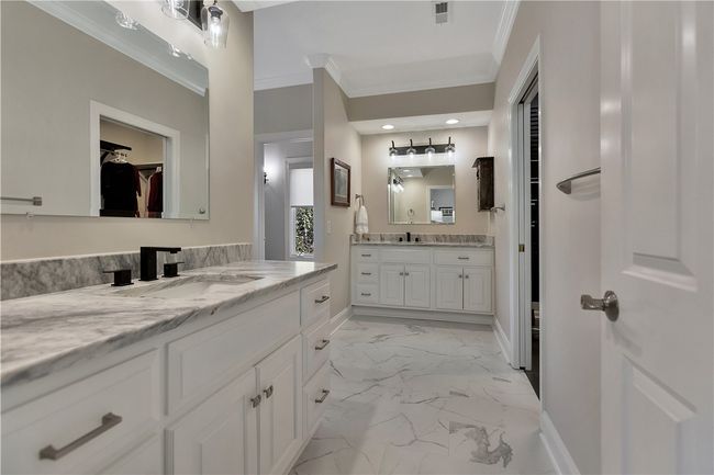 One of two vanities in the primary bathroom. | Image 26