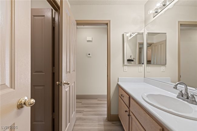 Bathroom featuring vanity and wood finished floors | Image 26