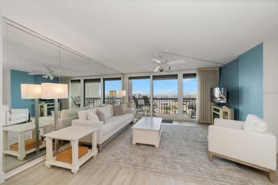 Spacious living room with water views | Image 3