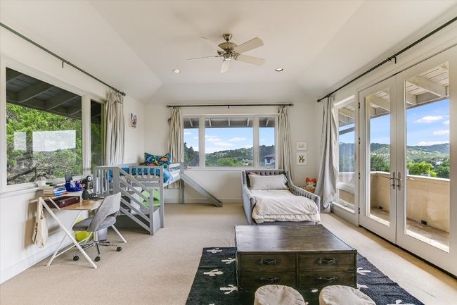 Sunroom / solarium featuring french doors | Image 30