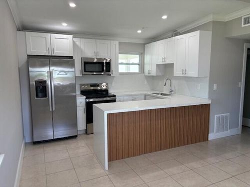 main-house-5580 Honeysuckle Drive, West Palm Beach, FL, 33415 | Card Image