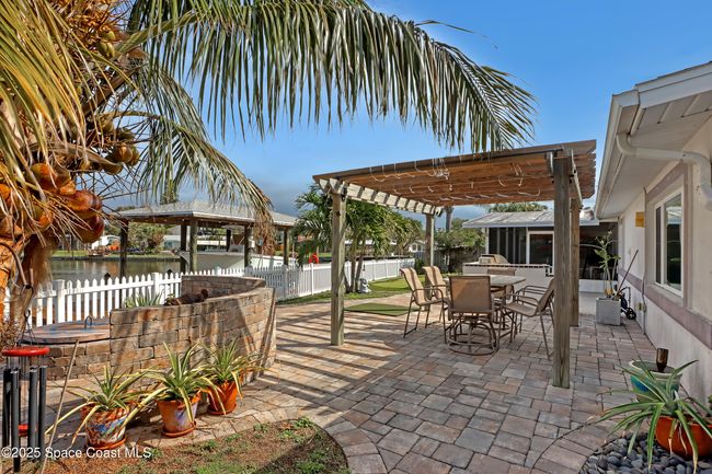 1061 Bali Rd, House other with 4 bedrooms, 2 bathrooms and null parking in Cocoa Beach FL | Image 51