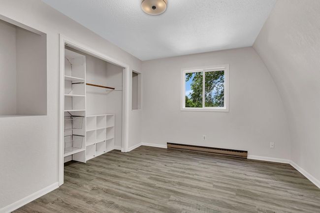 2nd bedroom on the upper level with built-in storage | Image 21