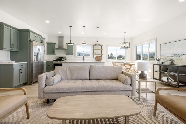 Living area featuring light wood-style floors and recessed lighting | Image 20
