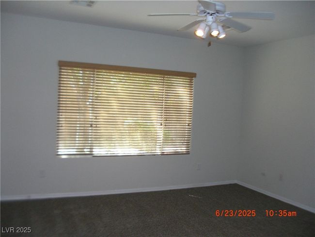 Ceiling fan and door to patio. | Image 8
