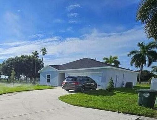 136 Dabou Loop, Belle Glade, FL, 33430-4279 | Card Image