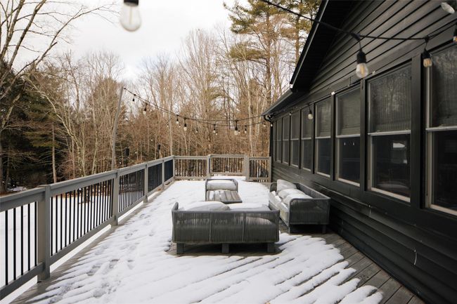 View of snow covered deck | Image 25