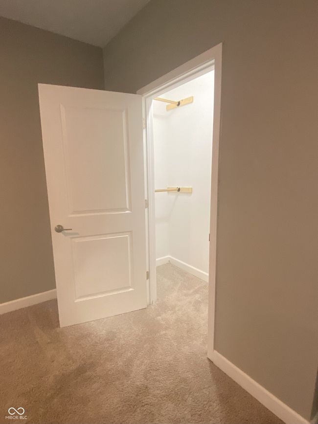 Spacious closet in main floor bedroom. | Image 11