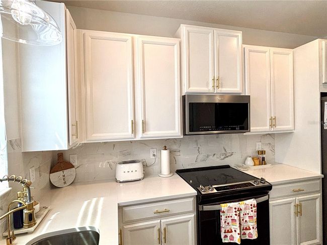921 Spring Palms Loop, Townhouse with 3 bedrooms, 3 bathrooms and null parking in ORLANDO FL | Image 19