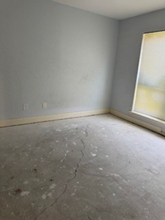 Spare room featuring baseboards | Image 8