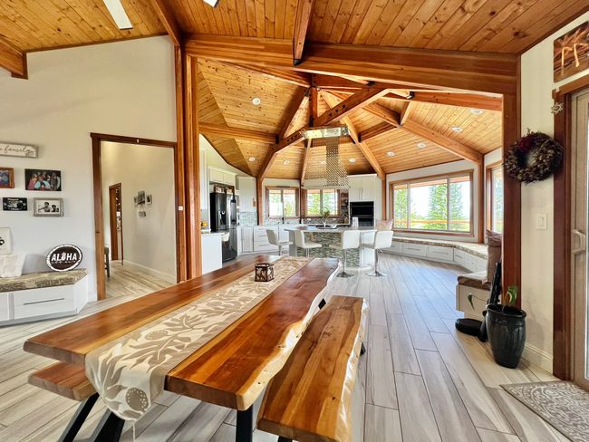 Dining room flows into the kitchen or out onto the deck. | Image 7