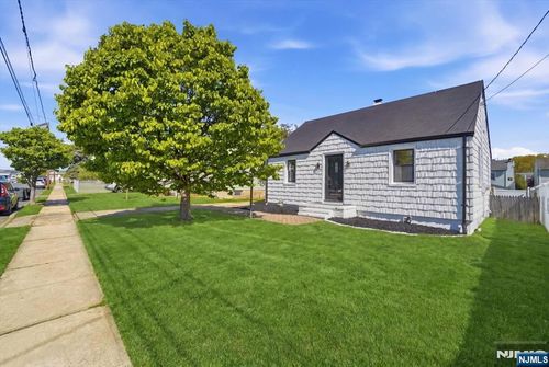 48 Delaware Ave, Carteret, NJ, 07008-1557 | Card Image