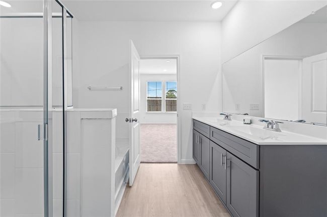 another view of primary bathroom with separate tub and shower | Image 18