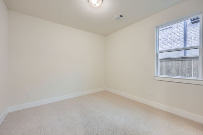Empty room featuring baseboards, visible vents, and light carpet | Image 23