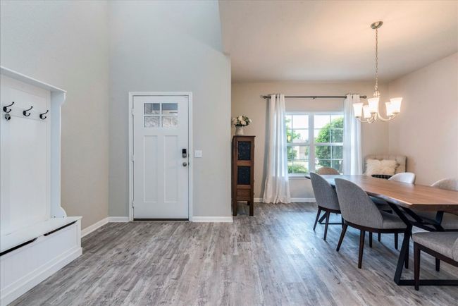 Foyer entrance and open dining | Image 5