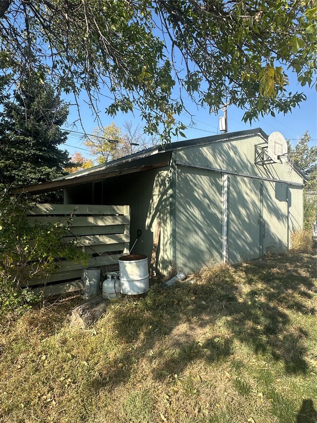 View of home's exterior with a yard | Image 24