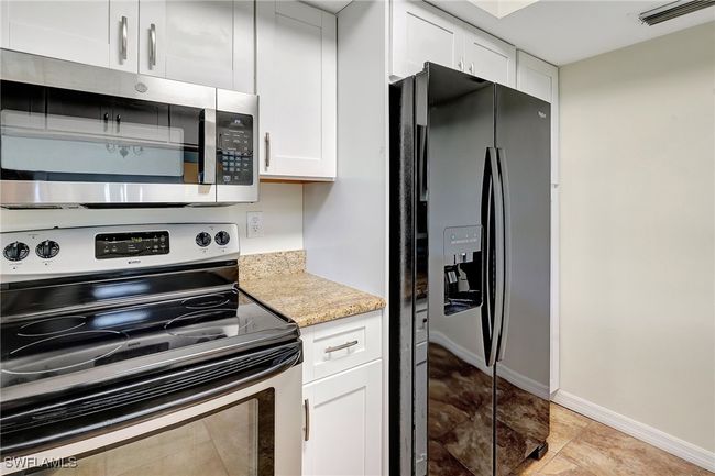 210 Ne 10 Th Ave, House other with 3 bedrooms, 2 bathrooms and null parking in Cape Coral FL | Image 6