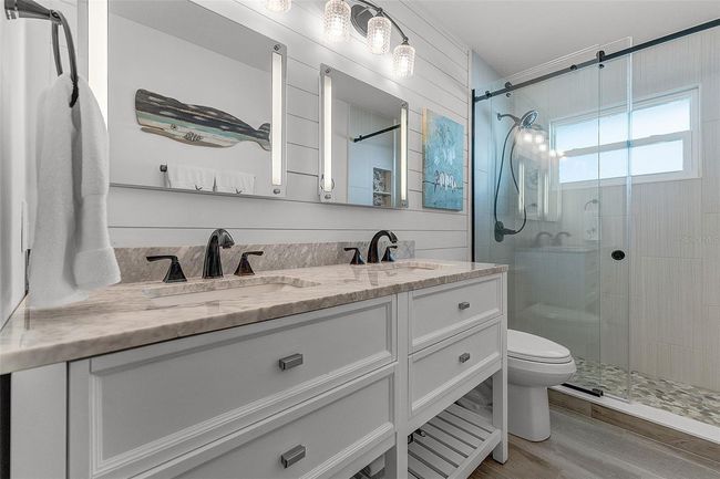 Upgraded Guest Bath with dual sinks and walk-in shower | Image 25