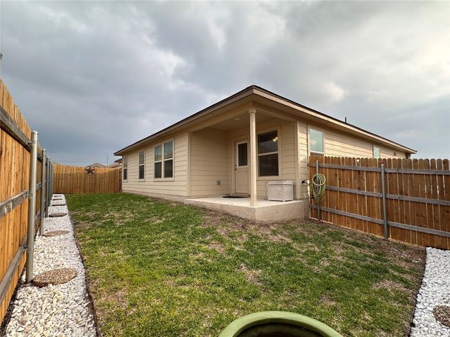 Rear view of property featuring a patio area | Image 38