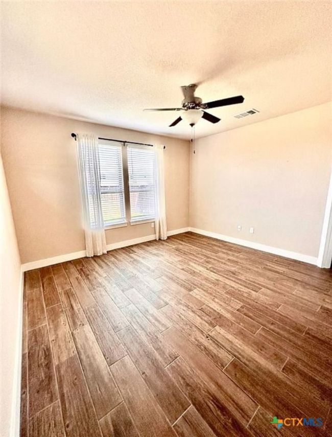 primary bedroom downstairs | Image 11