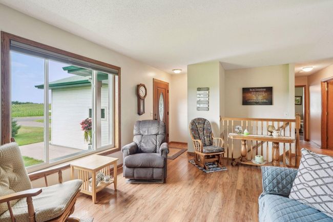 Huge panoramic window in the living room. The upper level windows are all new within the last year! | Image 26