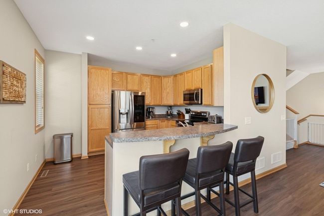 Kitchen counter with seating. Great for those busier days! | Image 11
