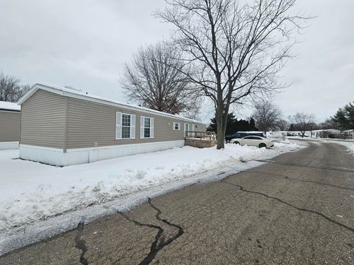 7156 Houndstooth Ave Sw, Grand Rapids, MI, 49548-7143 | Card Image