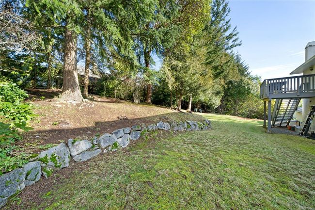 Thoughtfully landscaped; private backyard provides plenty of space for family use | Image 36
