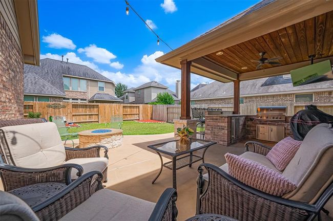 As you can see, even with all the thoughtful backyard enhancements, there’s still plenty of open space to walk, lounge, and enjoy the outdoors. | Image 42
