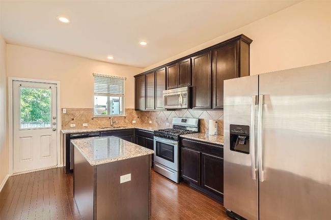 465 Moonwalker Trl, House other with 3 bedrooms, 2 bathrooms and 4 parking in Buda TX | Image 4
