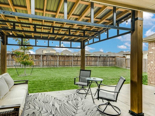 Your love of the outdoors has just received its just rewards! The extended, covered patio gives space for outside gatherings and an elevated night life! | Image 17
