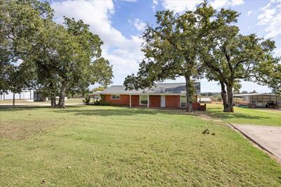 View of front facade featuring a front lawn | Image 1