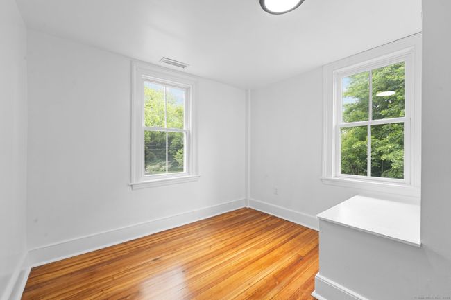 This home has wonderful light and captures the light through-out the home. | Image 33