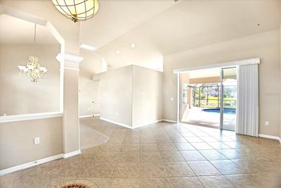 Spacious Living Room flows outdoors and overlooks the pool & canal | Image 3