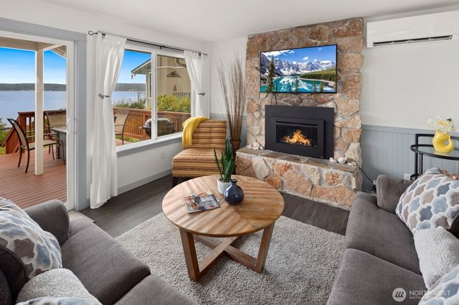 Living room open to expansive view deck | Image 11