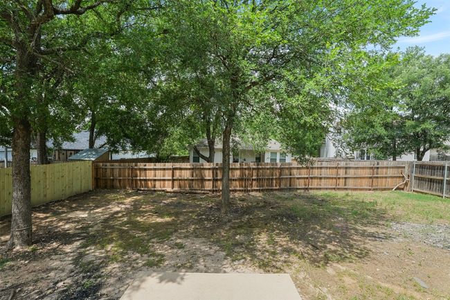 View of yard featuring a fenced backyard | Image 4